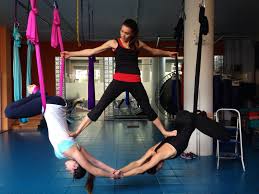 Aerial Yoga Hammock Acrobats Perfect Way To Start Your Day Aerial Yoga Poses Yoga Trapeze Aerial Yoga