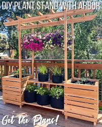 Diy wooden plant stand outdoor modern. Diy Outdoor Plant Stand With Arbor The Handyman S Daughter