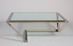 Modernist lucite glass top square coffee cocktail table. An Elegant Post Modern Coffee Table Iliad