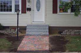 A Brick Walkway Leading To Granite Steps Makes For A Clean Look Brick Walkway Outdoor Decor Walkway