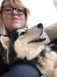 Adopted dog welcomes new furry sibling