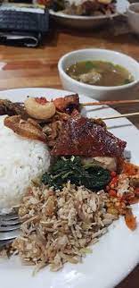 We try nasi campur (rice with various small dishes) and coconut pie at. Nasi Campur Picture Of Babi Guling Chandra Denpasar Tripadvisor