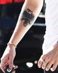 Harry styles is sporting some fresh ink!. Harry Styles Tattoo Guide Harry Styles Tattoos Meanings Explained