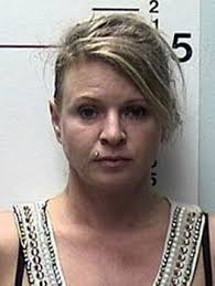 Woman sentenced in murder-for-hire plot targeted at estranged husband