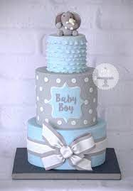 A Baby Boy Blue And Grey Baby Shower Cake Based On A Design By Cake Me Away Cakery Elephant Baby Shower Cake Baby Shower Cakes Shower Cupcakes