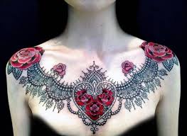 There are a few elements that you might find redundant, but a locket in the shape of a heart, two roses and two bees are the components of this chest tattoo and of a few other chest tattoos for men. 1001 Ideas For Beautiful Chest Tattoos For Women