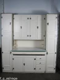 The center island replaces enough counter space to fit a clothes washer and dryer in the room. Antique Vintage Kitchen Cabinets Mcdougall Domestic Science 1920 S Hoosier Vintage Kitchen Cabinets Beadboard Kitchen Cabinets Beadboard Kitchen