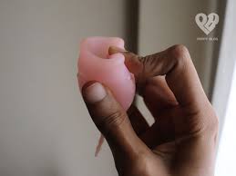 Squeeze the edge of the me luna with your thumb down and in, then squeeze make the meluna menstrual cup flat and fold the edges in a zigzag pattern, similar to the letter s. Menstrual Cup Review Pros Cons How To Use Peppy Blog