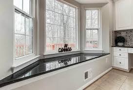 Add a bench, a table, and a couple of chairs to create a relaxing place to enjoy 3. Kitchen Bay Window Ideas Designing Idea