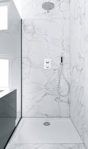 Like The Idea Of The Very Large Marble Tiles Less Grouting Plus The Preformed Shower Tray Is A Practica Tile Walk In Shower Shower Remodel Wet Room Flooring