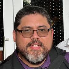 Is the passport book available for purchase at Target Field?