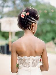 This hairstyle boasts a deep part and a low ponytail. 35 Curly Hair Wedding Styles For Long Medium Short Cuts