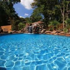 Jewelscapes reflective azora is a stunning azure gem pool finish made of a dynamic blend of dark blue, cerulean and gray pool tiles, producing turquoise water. Bright Blue Water Boulder Grotto Jewelscapes Aquamarine Finish Aquascapes Azure Tile Pool Finishes Blue Pool Pool Paint