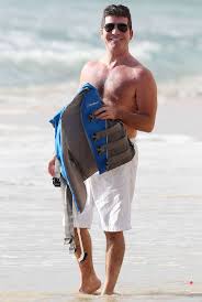 Sean justin penn (born august 17, 1960) is an american actor, director, screenwriter, and producer. Sean Penn And Simon Cowell Go Topless On The Beach As They Indulge In Watersports Celebrity News Showbiz Tv Express Co Uk