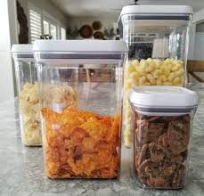 If you want the good oxo containers, stick with the awesome 'steel lid' pop containers (assuming they have not been remade. Pantry Organization Makeover With The Container Store House Becomes Home Interiors