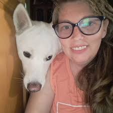 What causes mucus film around Pomeranian poop?