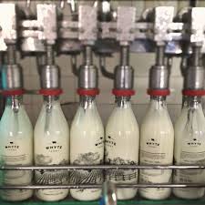 Milk Bottling Fresh Organic Milk Delivered In Glass Bottles To Your Home In Delhi Ncr Whyte Farms In 2020 Farm Fresh Milk Organic Milk Bottle