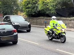 Edinburgh locals catch sight of royals as police escort makes way through capital