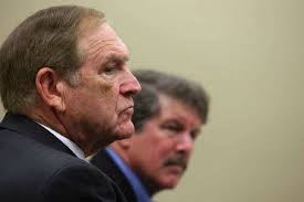 Coach resigns, blasts district