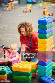 464 Preschool Playground Teacher Stock Photos, High-Res Pictures, and  Images