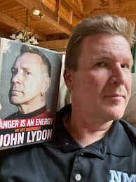 NMH librarian Jesselyn Dreeszen Bowman recently asked, “What are you  reading?” Jim Overton, manager of NMH Dining Services, is reading “Anger is  an Energy” by John Lydon, aka Johnny Rotten, lead singer
