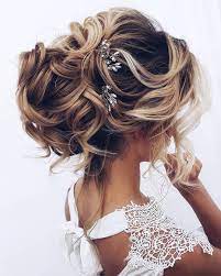 This look is perfect for a wedding, holiday party, or just a night out with your girls. 20. Curly Wedding Hairstyles From Playful To Chic Wedding Forward
