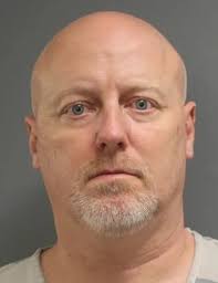 Department of Corrections criminal investigator charged with assault