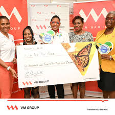 The VM Group, through the 2022 President's Circle Awardees 'Pay it Forward'  initiative, this week handed over $632,000 to the Food for the Poor, to  support with the construction of a home