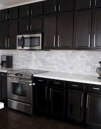 20 Dark And Elegant Kitchen Decoration Ideas Eweddingmag Com Backsplash With Dark Cabinets Dark Kitchen Cabinets Kitchen Remodeling Projects