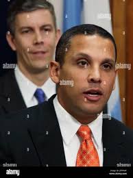 Chicago Transit Authority President Ron Huberman responds to questions  after being name by Chicago Mayor Richard M. Daley to replace Education  Secretary Arne Duncan, rear, as CEO of the Chicago Public Schools