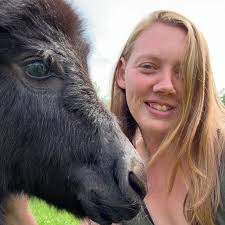 What type of parrot is friendly and talks?