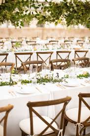 Modern Minimalist Clean White And Green Wedding In A Greenhouse On The California Coast Santa Wedding Table Setup Brown Chairs Wedding Green Gold Weddings