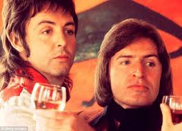 Who is Paul McCartney's brother, and what does he look like?
