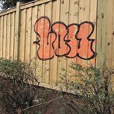 Spray down the door with a garden hose to remove any dust, dirt, grime and the chipped off paint or graffiti from the garage door. Best Way To Remove Graffiti From Wood Fence