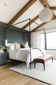 A grand canopy bed designed by architect michele bonan emphasizes the high ceilings of a bedroom in an a lakeside villa in switzerland has a master bedroom with a decadently whimsical aesthetic, complete you can always rely upon a canopy bed to turn an ordinary room into a sumptuous refuge. Trends We Love Canopy Beds Studio Mcgee Modern Farmhouse Master Bedroom Home Decor Bedroom Modern Farmhouse Bedroom