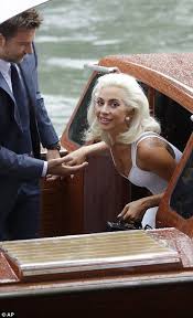 Lady Gaga Holds Hands With Bradley Cooper At A Photocall At Venice