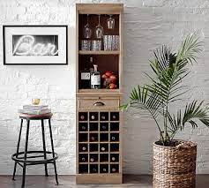 This dapper wine cabinet holds up to 12 bottles of your favorite. Modular Bar Tower Pottery Barn