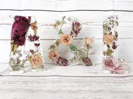 This tutorial is going to show you how to resin flowers in a bezel pendant. Wedding Flower Preservation Diy Resin Flowers How To Preserve Flowers Resin Crafts
