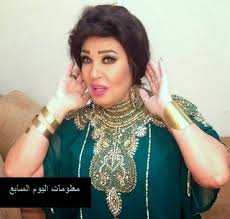 بالصور فيفي عبده مثيرة وجذابة بالعباءة الخضراء Statement Necklace Necklace Sari