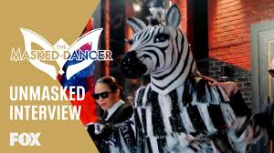 Fans have been split on who this dancer is, but we have been following the clues since his first performance to confirm his identity. Masked Dancer Reveals Zebra Chicago Tribune