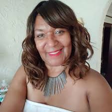 Lemon chicken and rice meal for 100 people served