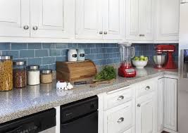 Make a white subway tile temporary backsplash with removable wallpaper. Our Modern Cottage Kitchen Makeover Rental Kitchen Diy Kitchen Backsplash Removable Backsplash