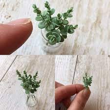 香りも素敵なユーカリ ユーカリ 調べてみると 500種類以上あるらしい とりあえず ユーカリの葉っぱのみ ミニチュア ユーカリ 粘土 mococo 小さな幸せ チイサイモノ展 色が好き miniatures polymer clay herbs