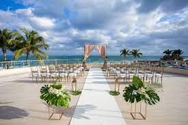 Beautiful Pink And Gold Ceremony Set Up With Touches Of Greenery Create Your Dream W Dreams Riviera Cancun Resort Riviera Cancun Wedding Cancun Wedding Venues