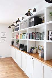 And even though this option is using a tray on your island is a kitchen hack that can make it seem like you have extra counter top space. Ikea Built In Hacks That Will Save You Money Ikea Built In Living Room Built Ins Home Office Cabinets