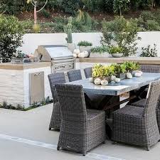 Dark Gray Granite Outdoor Dining Table With Gray Wicker Chairs Outdoor Kitchen Decor Outdoor Kitchen Ideas Awesome Outdoor Dining Table