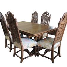 There is one shelf in the center cabinet area which divides the height of the space equally in half. Lot Art Batesville Cabinet Company Carved Oak Dining Table And Chairs