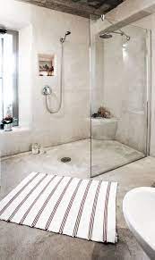 Your bathroom shower floor tiles should prioritize traction in light of the number of bathroom accidents related to accidental slippage. 30 Gorgeous Master Bathroom Design Ideas We Re Loving Rustic Bathrooms Concrete Bathroom Bathroom Design