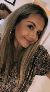 JACLYN switched her look completely from "elegant" to "super-sexy " in this  fuchsia curve-huggimg minidress and accessories in same color. Going  bar-hopping tonight in South Beach.l