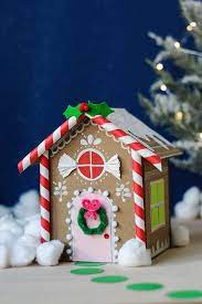 How To Make A Cardboard Gingerbread House For Christmas These tiny cardboard gingerbread houses light up and are a fun and easy diy project this holiday season! cardboard gingerbread house for christmas